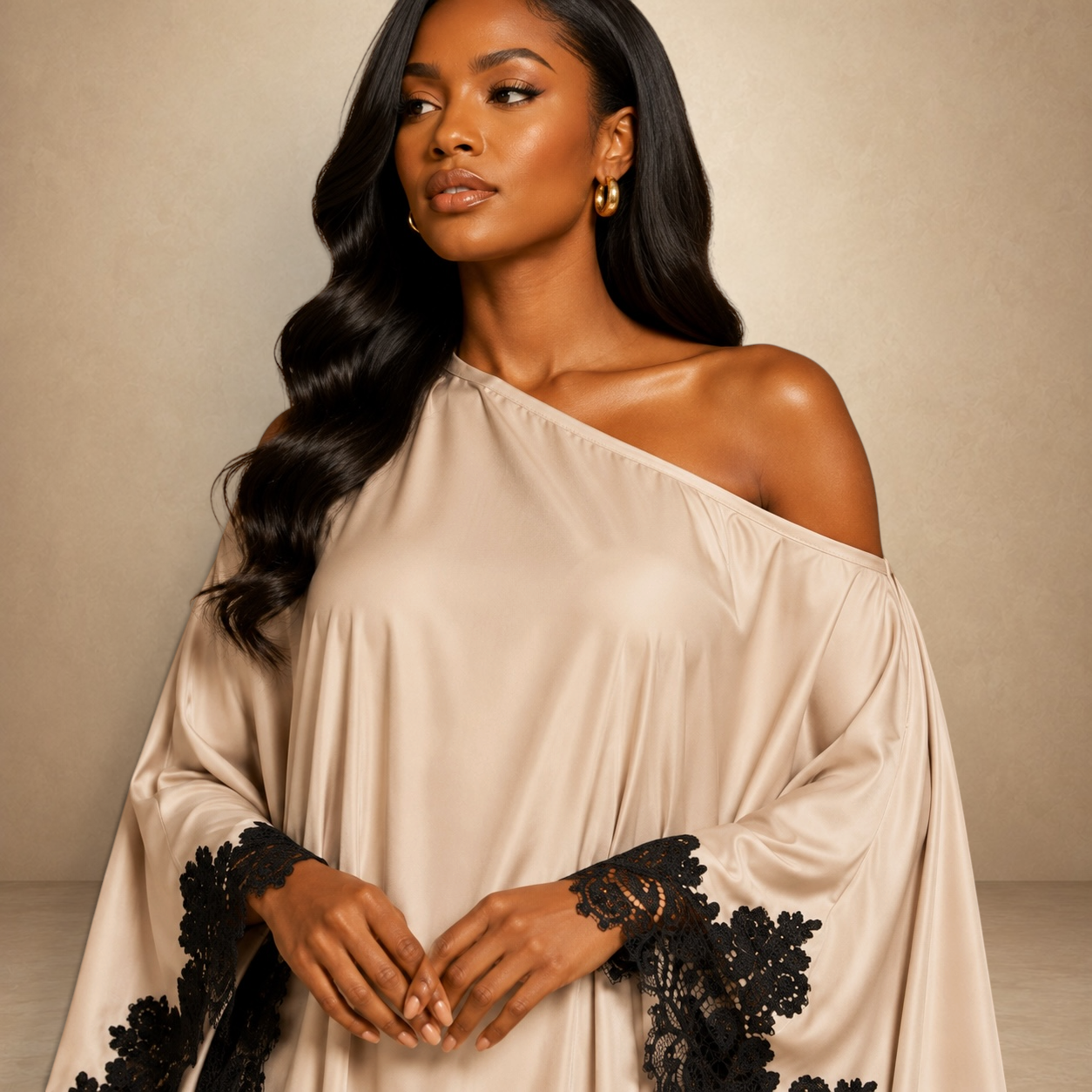 SILKANDLUXE elegant champagne kaftan maxi dress with black lace trim on sleeves and hem. Off-shoulder design.