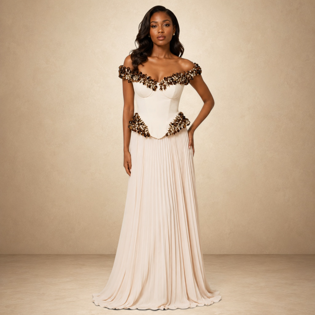 SILKANDLUXE cream off-the-shoulder gown with embellished corset bodice and pleated skirt.
