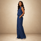 SILKANDLUXE indigo denim wide-leg pants with wrap skirt overlay and contrast stitching.