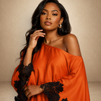 SILKANDLUXE vibrant orange off-the-shoulder kaftan maxi dress with black lace trim on sleeves and hem.