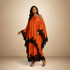 SILKANDLUXE vibrant orange flowing kaftan maxi dress with black lace trim and off-the-shoulder neckline.